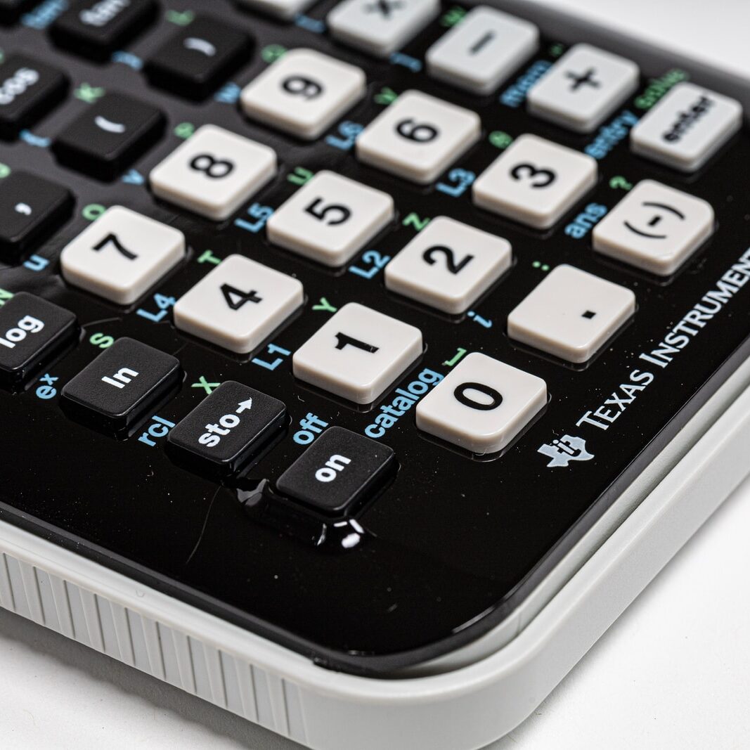 black and white Texas Instruments calculator